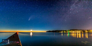 Comet NEOWISE over the Frankfort and Elberta piers with the town of Frankfort and Lake Michigan.