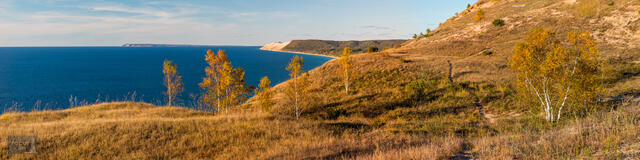 Trail through dunes with sweeping views of Lake Michigan and Sleeping Bear Dune.