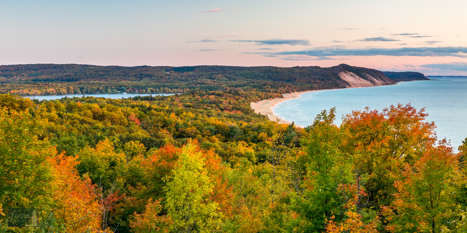 View to south from Green Point Dunes, showing Old Baldy, Lower Herring Lake and Lake Michigan shoreline and autumn colors.