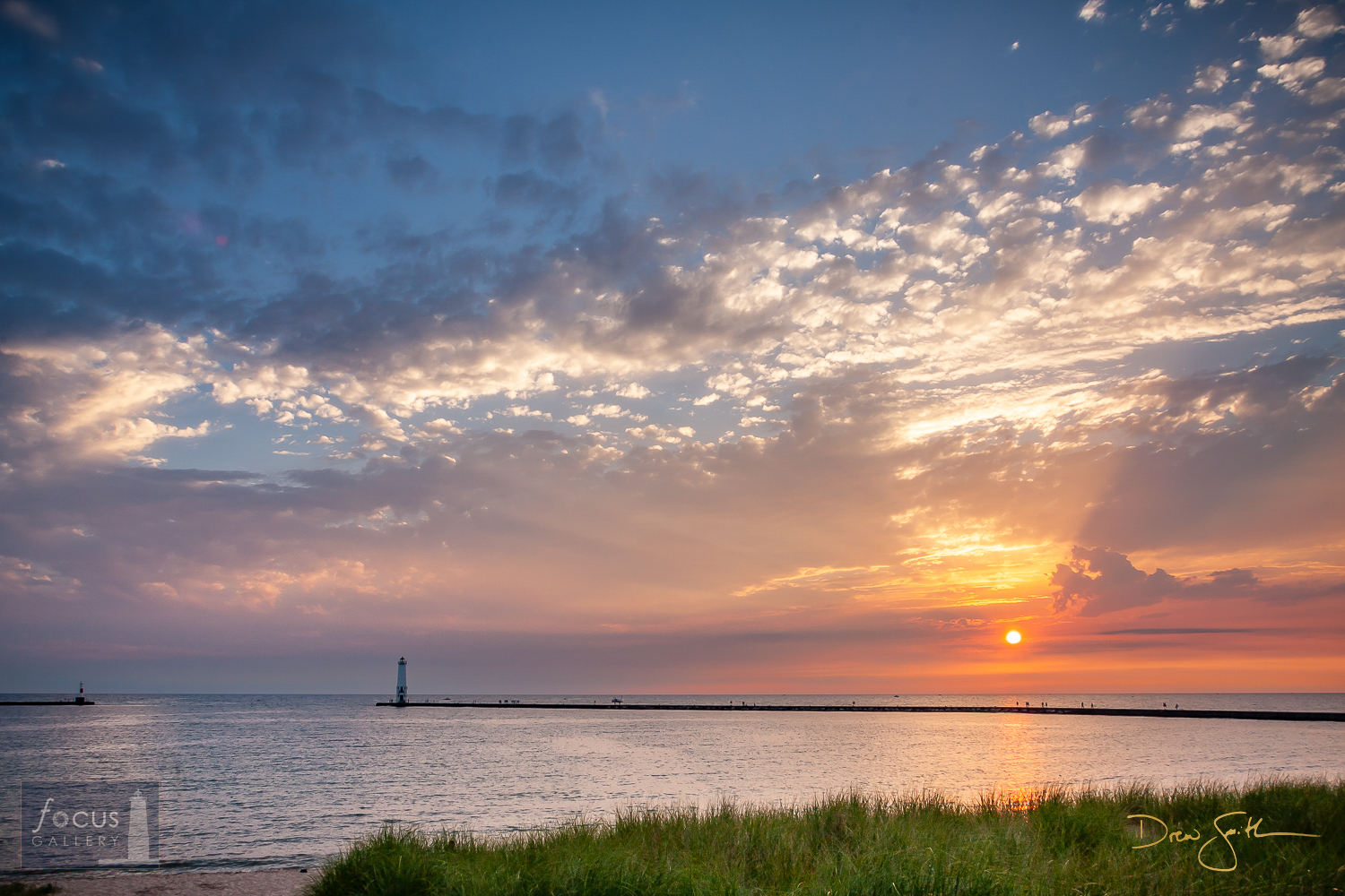 Sunset over Frankfort North Breakwater Lighthouse Please use the "Email Focus Gallery" link below for information on available...