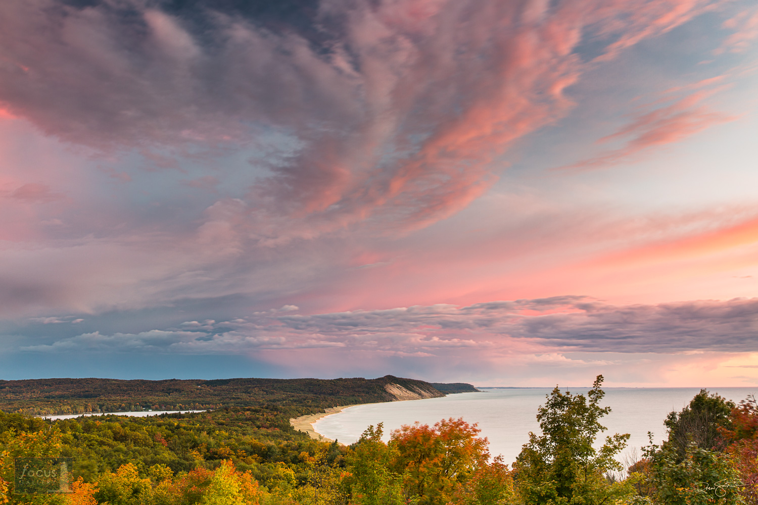 Clouds at sunset over Green Point Dunes, Old Baldy, Lower Herring Lake and Lake Michigan in the fall.