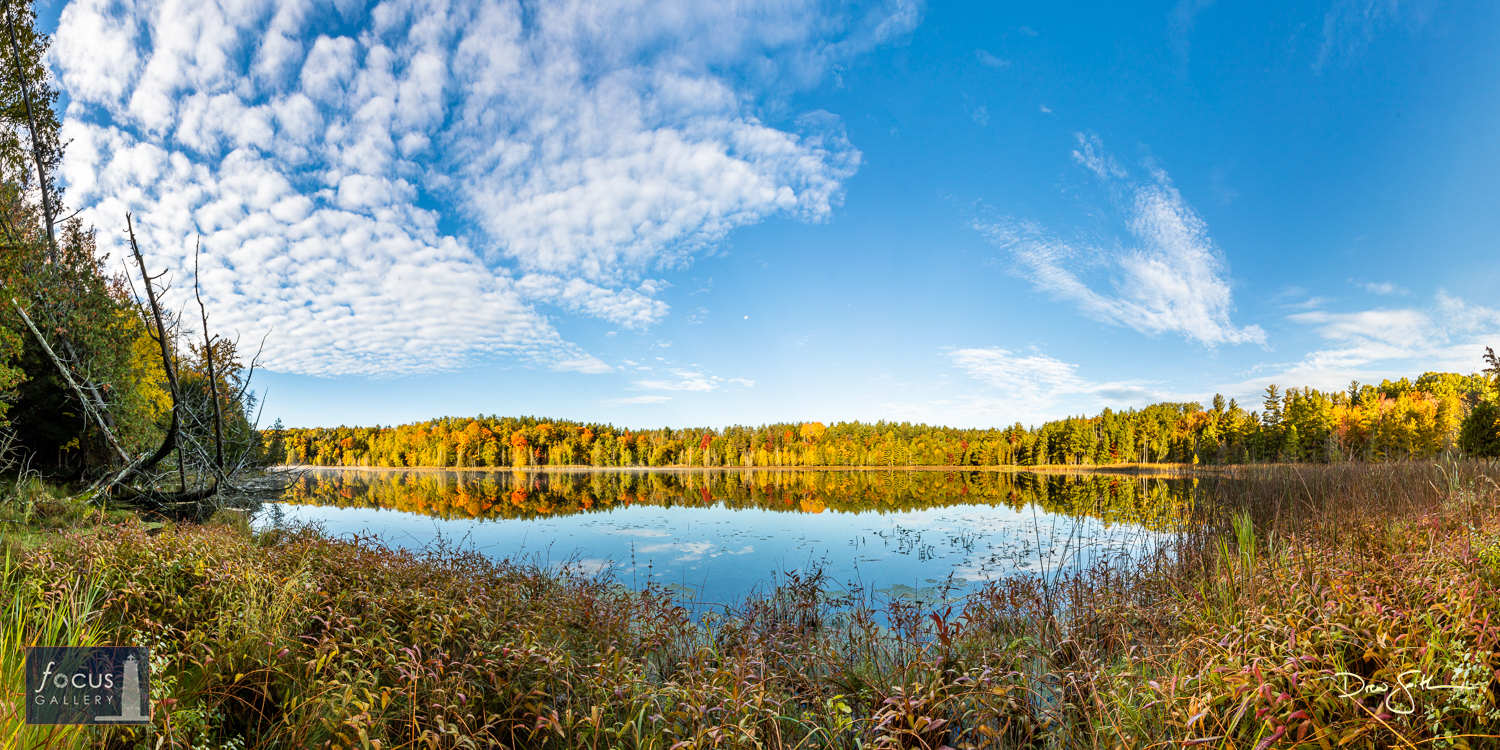 Photo © Drew Smith Sweeping view of Lower Woodcock Lake on an autumn afternoon. This image was taken on land protected by the...