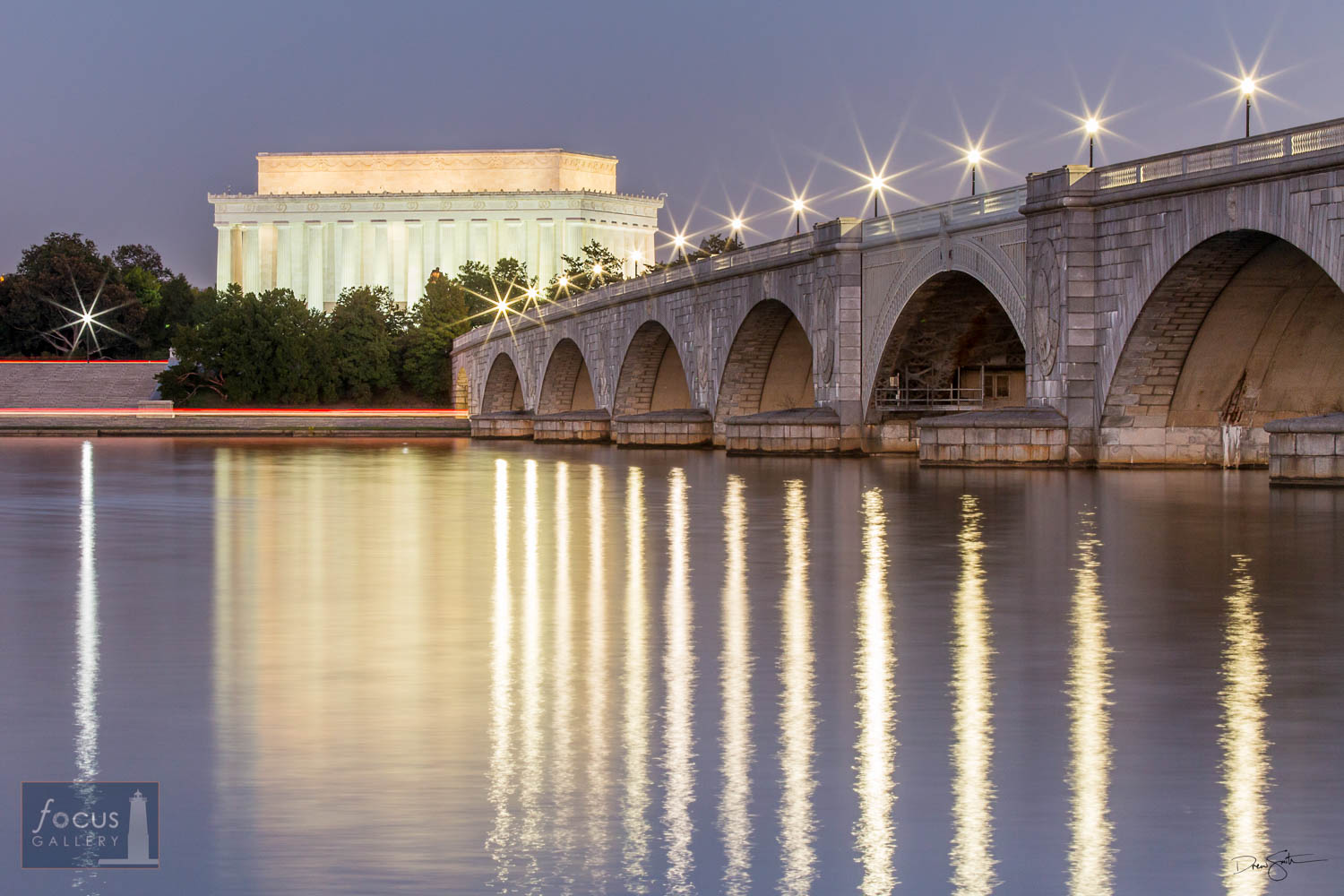 Photo © Drew Smith The Lincoln Memorial and Memorial Bridge reflect on the Potomac River at dusk.