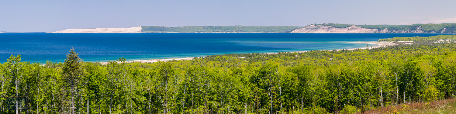 Sweeping panoramic view of Sleeping Bear Dune, the Empire Bluffs, Platte River Point and Platte Bay on Lake Michigan.
