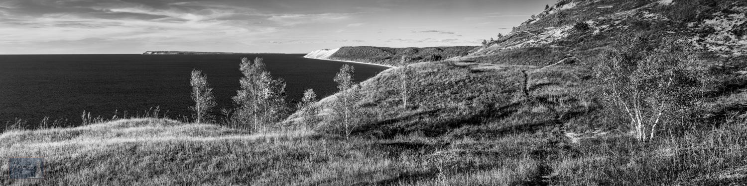 Black and white photograph of a trail through dunes in Sleeping Bear Dunes National Lakeshore.