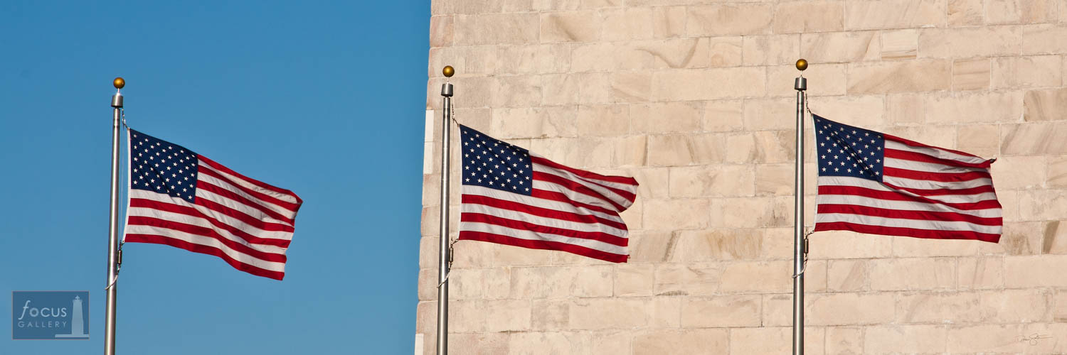 Photo © Drew Smith American flags fly at the base of the Washington Monument on the National Mall, Washington DC